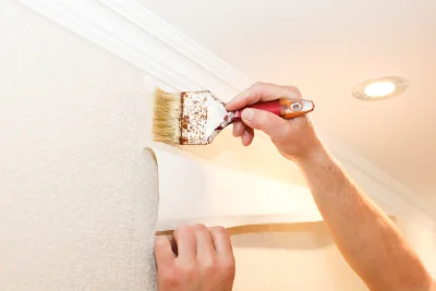 Pose de papier peint à Voisey — revêtements muraux et toiles de verre